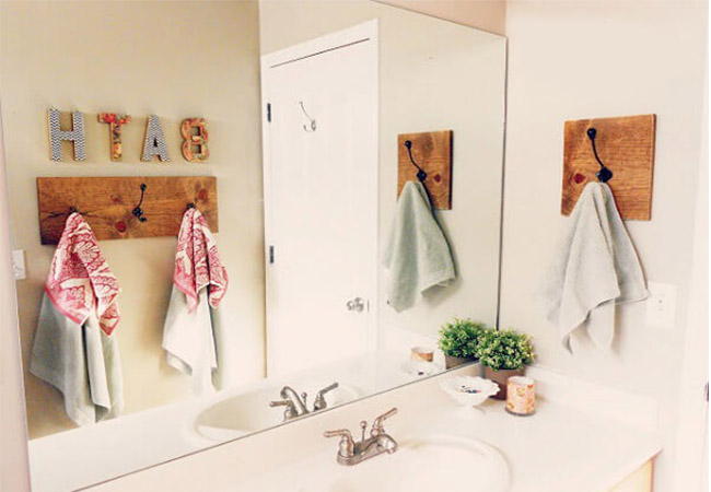 عکس تزیین دیوار دستشویی با چوب