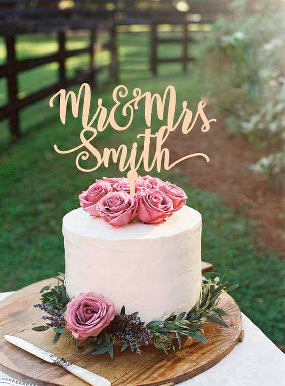 عکس کیک خامه ای سالگرد عروسی تزیین شده با گل رز  