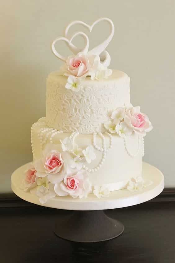 عکس کیک دو طبقه سالگرد عروسی عاشقانه با تزیین گل رز  