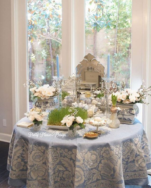 تزیین سفره هفت سین عروس روی میز با گل 