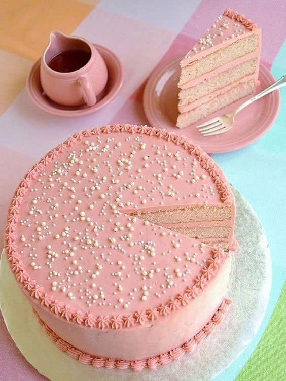 مدل کیک خامه ای خانگی ساده تزیین شده با اسپرینکل و ماسوره