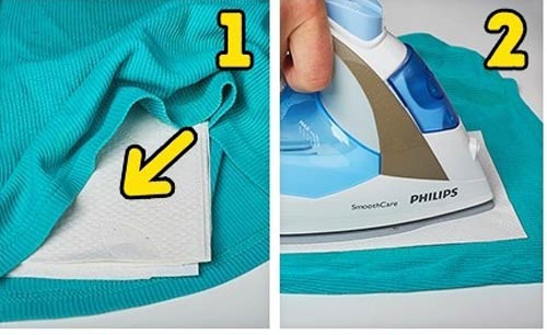 استفاده از اتو برای پاک کردن لکه روغن از روی لباس