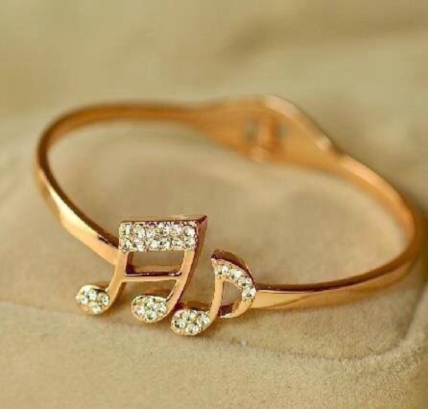 انگشتر لاکچری نگین‌دار نوت موسیقی زیبا