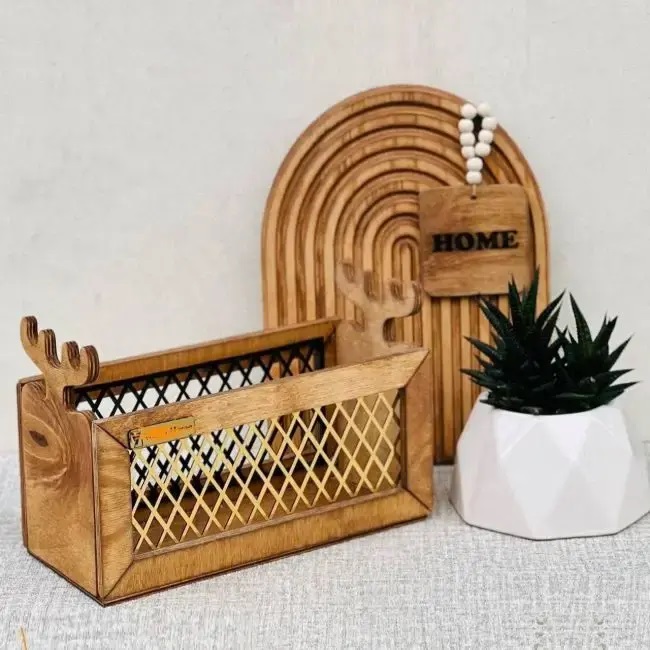 A wooden box and a plant in a potAI-generated content may be incorrect.