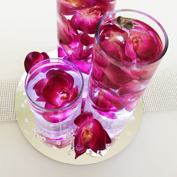 عکس تزیین شمع با گل‌های بهاری
