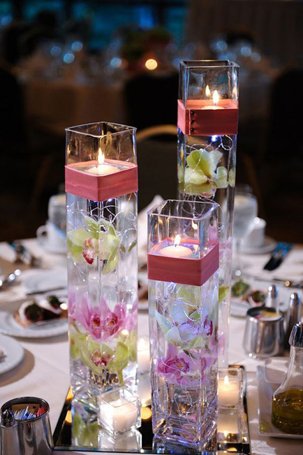 عکس تزیین شمع با گل‌های بهاری