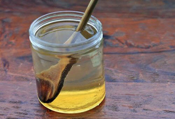 درمان زخم معده با عسل و آب ولرم