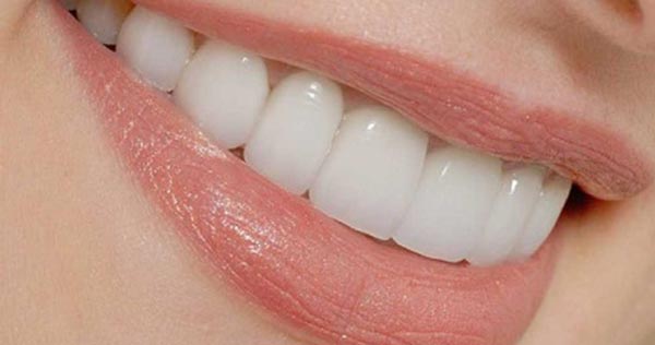 عکس کاربردهای روغن لیمو - سفید کردن دندان