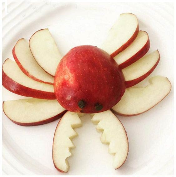 عکس میوه آرایی با سیب برای کودکان