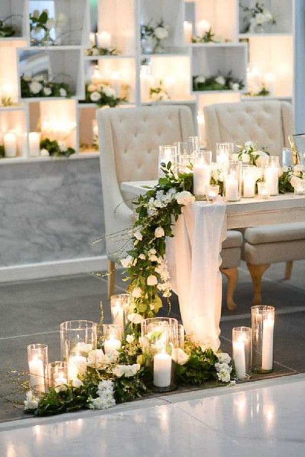 تزیین میز نهار خوری عروس و داماد با گل و شمع