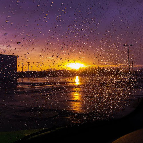 عکس غروب خورشید در هوای بارانی
